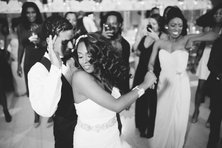 Top Atlanta Blogger, Danielle YB Vason, shares behind the scene pictures from her wedding | Wedding Cake Cutting